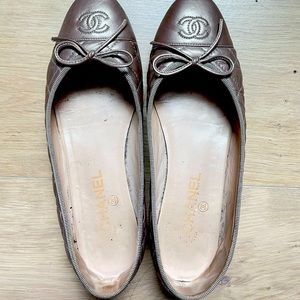 Gold Chanel leather flats